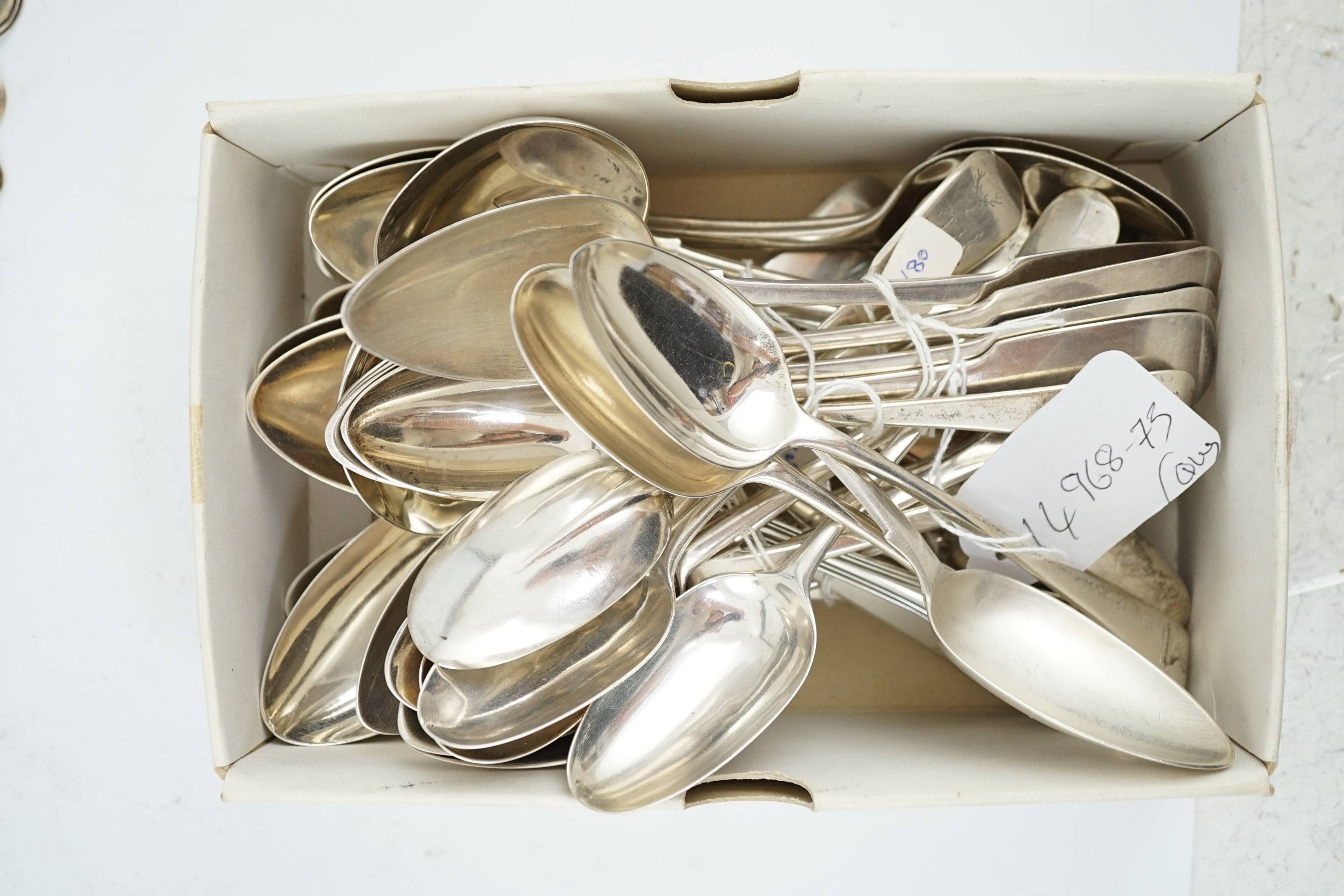 A small collection of assorted mainly 19th century silver dessert spoons, various dates, makers and patterns and two pairs of sauce ladles, London, 1824 and London, 1830